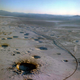 Illustration for article titled See Nevada's Hellish Nuclear Moonscape From Above